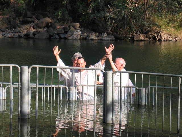 Mikal being baptized