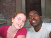 Katie & Mike on the steps of the church in town square