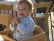 Preston in his highchair