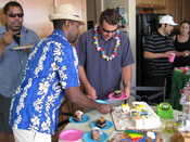 Mike cutting the cakes