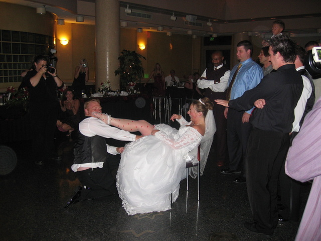 Brandon removing the garter