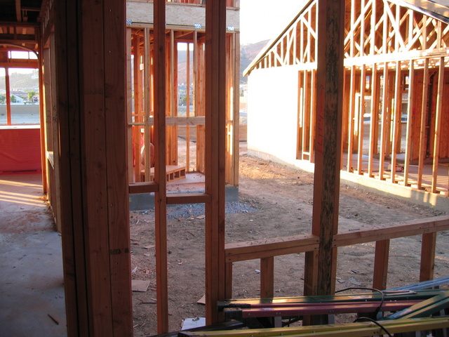 View of Side Courtyard w/ Fireplace