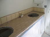 Bathroom #4 Tiling  -- no grout yet