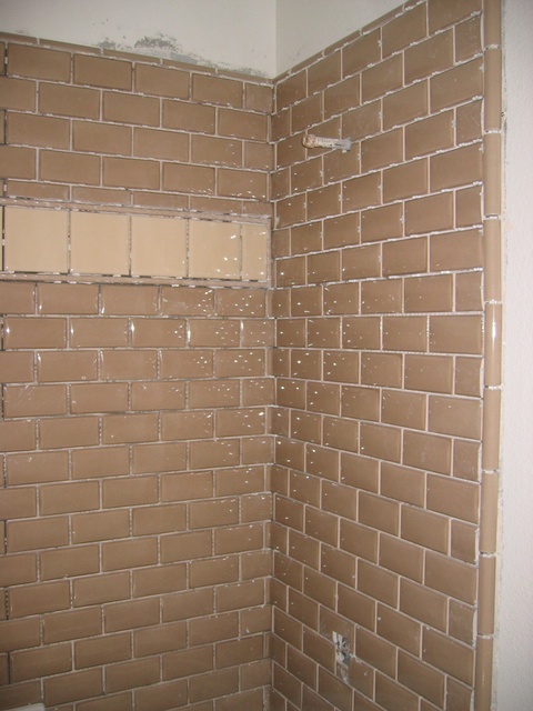 Bathroom #4 Tiling  -- no grout yet