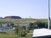 The mountains behind the stadium