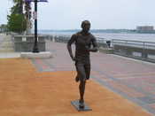 Weird Running Man on Boardwalk